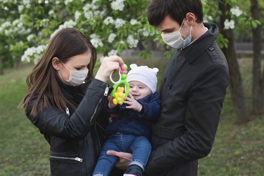 Family wearing protective medical mask for prevent virus Covid-19