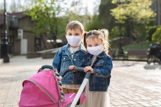 Portrait boy and girl with face mask protection. Coronavirus, covid-19