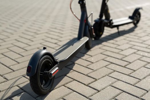 Modern electric scooters parking on the street