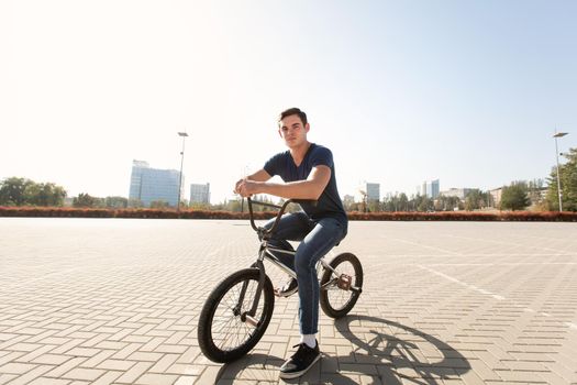 Young urban bmx racer in the city