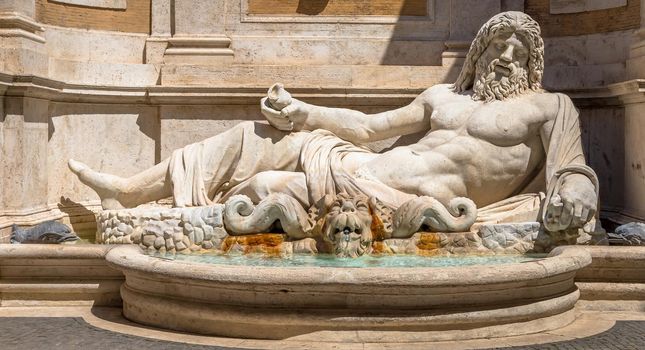 ROME, ITALY - CIRCA AUGUST 2020: famous Greek sculpture of Ocean god, named Marforio. Classic mythology in art.