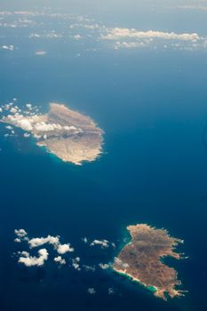 Top view aerial photo, tropical island in open sea