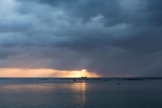 Aerial panoramic view of sunset over ocean.