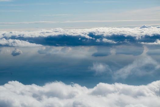 Beautiful blue clouds from the plane window