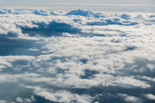 Beautiful blue clouds from the plane window