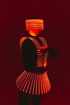 Disco dancer moves in UV ultraviolet suit