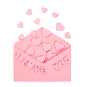 Pink love letter and wooden painted hearts and I love you letters isolated on white background