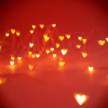 Light heart background, romantic love bokeh background in pink for Valentine's day or wedding