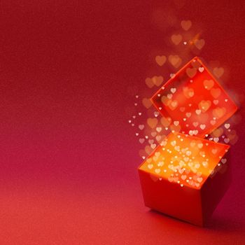 Magic box with love gift for Valentines day, pink red glowing with light from inside with bokeh hearts on glitter background with copy space for text