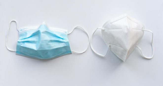 Viruses and bacteria protection masks isolated on white background. Surgical mask and ffp2 mask.