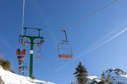 old chairlift at mountain ski resort on sunny day. High quality photo