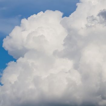 White clouds on blue sky background. Natural backdrop