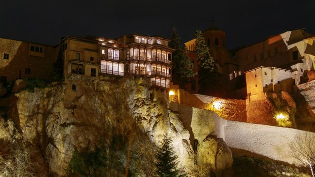 Night view of hanging houses over the rocks in Cuenca, Spain