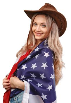 Portrait of a young smiling woman holding USA flag isolated on white background