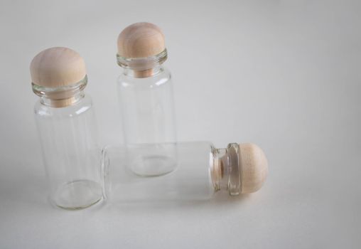 Empty bottles with wooden stoppers for storage. Place for your text.