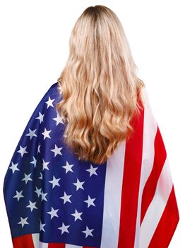 Portrait of a young smiling woman holding USA flag isolated on white background