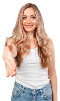 Portrait of pretty young woman holding out her hand to greet someone isolated on white background, close up