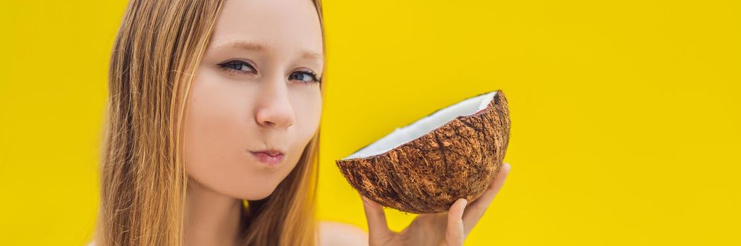 Young woman doing oil pulling over yellow background. BANNER, LONG FORMAT
