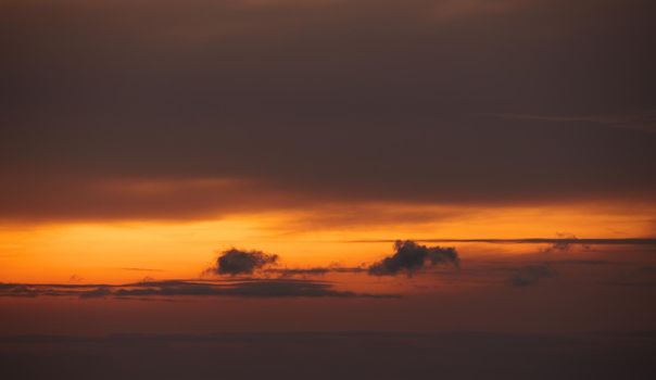 Dramatic and moody sunset sky with multicolor clouds. sky for replacement in architectural photography or 3d design or for background or texture.