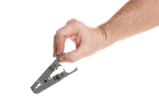 Hand holds a wire stripper on a white background, a template for designers.