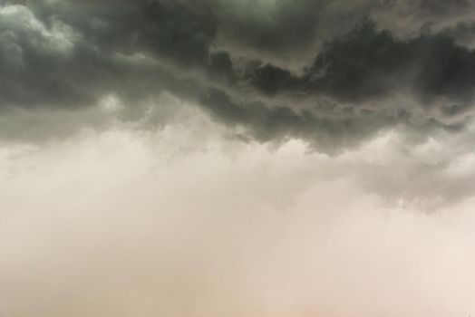 Gloomy clouds have shrouded sky before a thunderstorm.