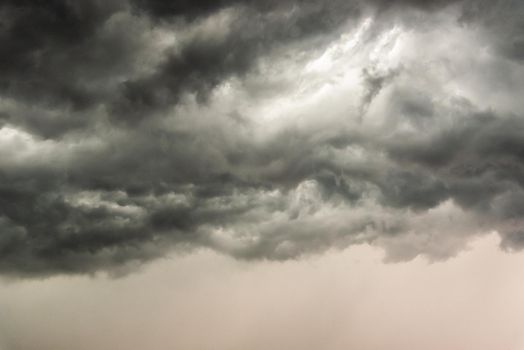 Gloomy clouds have shrouded sky before a thunderstorm.