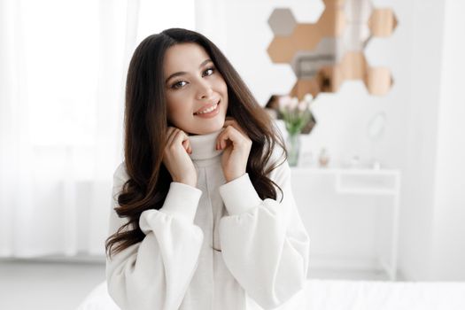 Young happy woman portrait at home. High quality photo