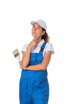 Female house painter with paint brush isolated on white background, full length portrait