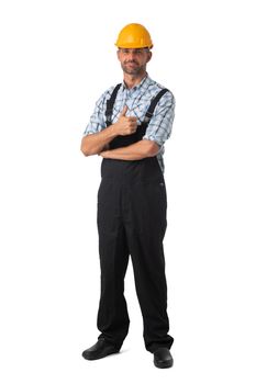 Authentic construction worker giving a thumbs-up sign. Full body portrait isolated on white.