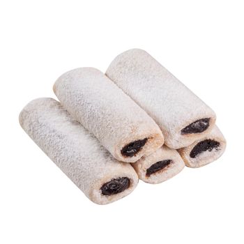 Sweet appetizing shortbread cookies logs filled with plum jam, sprinkled with powdered sugar isolated on white background. Popular pastries