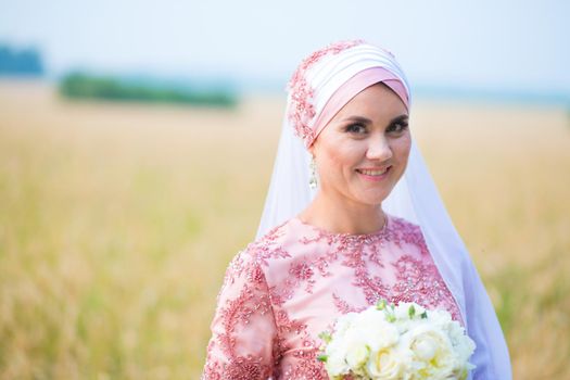 Beautiful female model in traditional bridal costume. Muslim marriage.