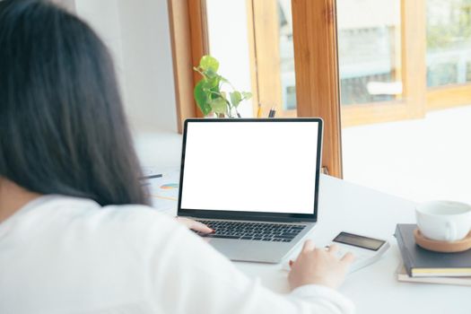 Cropping hands using computer laptop. Blank screen computer laptop for graphic display montage.