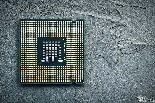 Close-up of CPU Chip Computer Processor. Top view. Gloomy dramatic toned