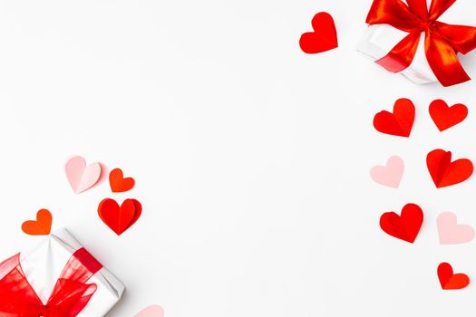 Valentine's Day background. Gifts, hears on white. Concept of love, affection. Holiday card.