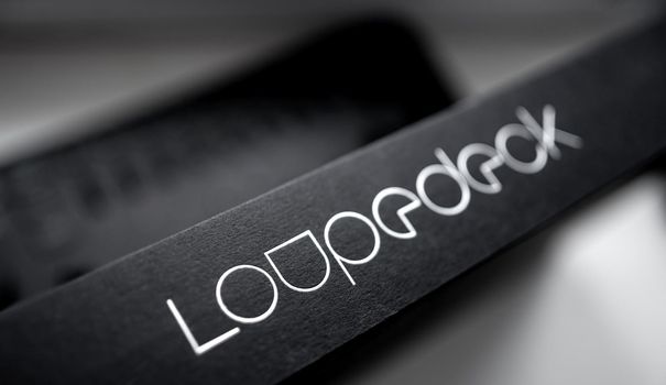 Kyiv, Ukraine - 28 December 2021: Loupedeck logo with Photo editing panel