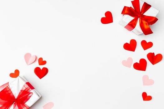 Valentine's Day background. Gifts, hears on white. Concept of love, affection. Holiday card.