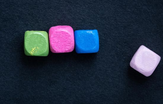 Close up view of colorful wooden letter beads