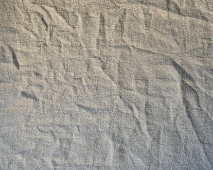 Natural linen texture background. Crumpled fabric of gray color, rough texture, copy space