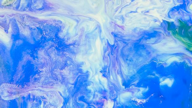 Blue streaks on a white background. Liquid abstractions. Abstract natural art. Abstract painting. Marble effect painting. Mixed azure and white oil paints. Unusual handmade background for poster, card, invitation.