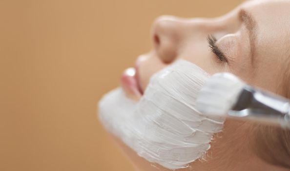 Spa facial mask application. Spa beauty organic facial mask application at day spa salon