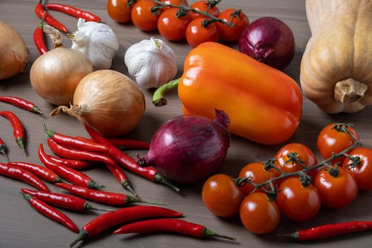 Close-up of fresh farm vegetables on kitchen table. Healthy food, harvest. Selective focus.