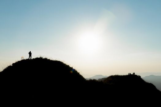 Silhouette traveler on big mountain at Thailand