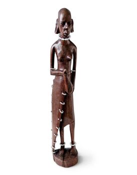 Traditional wooden figurine from Tanzania isolated on white background. Carving handicraft human statuette