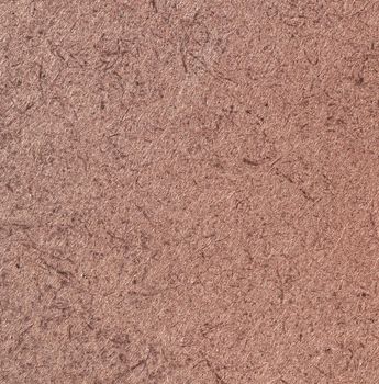 A close up of a brown fibreboard background. High quality photo