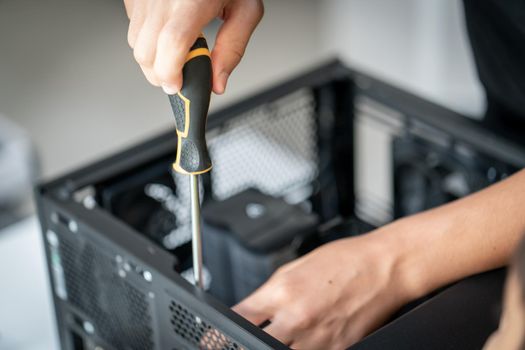 Repair of the computer system unit in the service center. High quality photo