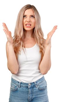 Emotional angry woman screaming on white isolated studio background, portrait