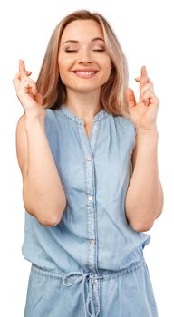 Young woman wishing for good luck isolated on white background, close up