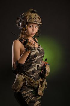 girl in a military uniform helmet says on the radio