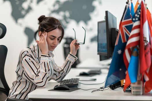 Beautiful Shocked and Annoyed Young Woman Looking at her Laptop. Sad Operator Agent Woman Working from Home in a Call Center. High-quality photo