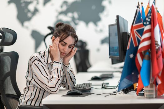 Beautiful Shocked and Annoyed Young Woman Looking at her Laptop. Sad Operator Agent Woman Working from Home in a Call Center. High-quality photo